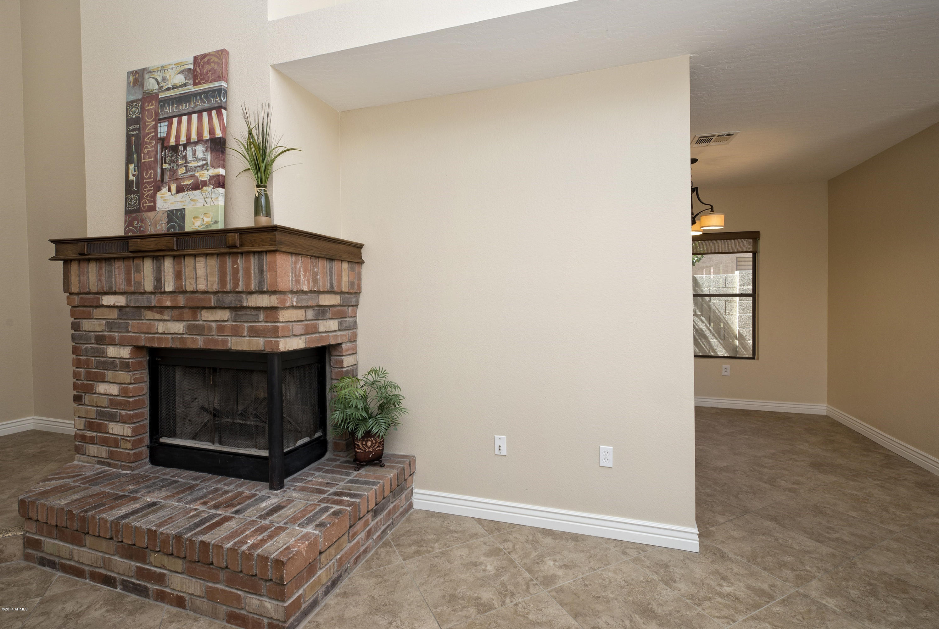 1268 East Mineral Road Gilbert, AZ 85234 - Photo 8 of 18 008_2-Sided Wood Burning Fireplace