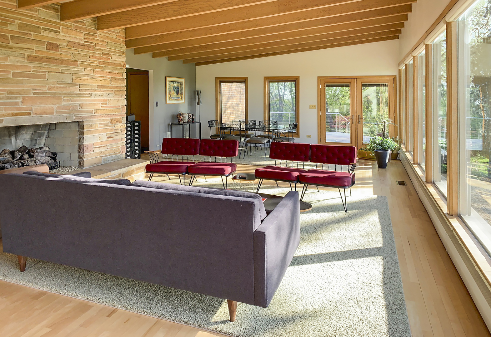 38W481 Silver Glen Road St. Charles, IL 60175 - Photo 3 of 21 a living room with furniture a fireplace and large windows