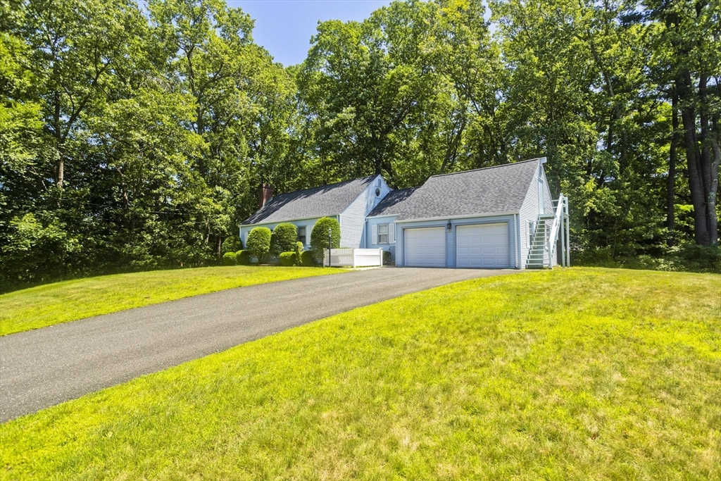 102 West Meadowview Road Holyoke, MA 01040 - Photo 3 of 39 a house with swimming pool in front of it