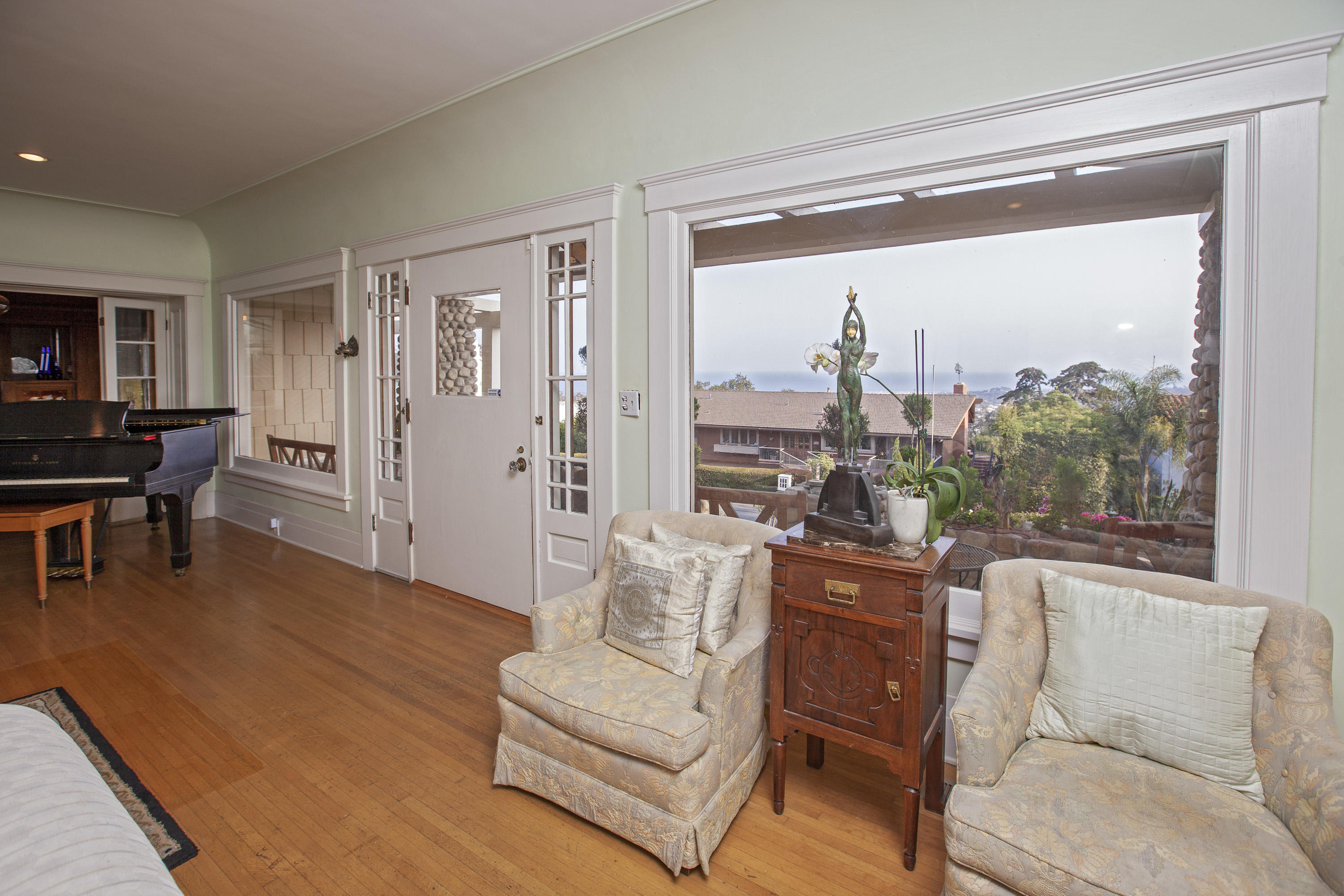 1720 Lasuen Road Santa Barbara, CA 93103 - Photo 11 of 32 a living room with furniture and a large window