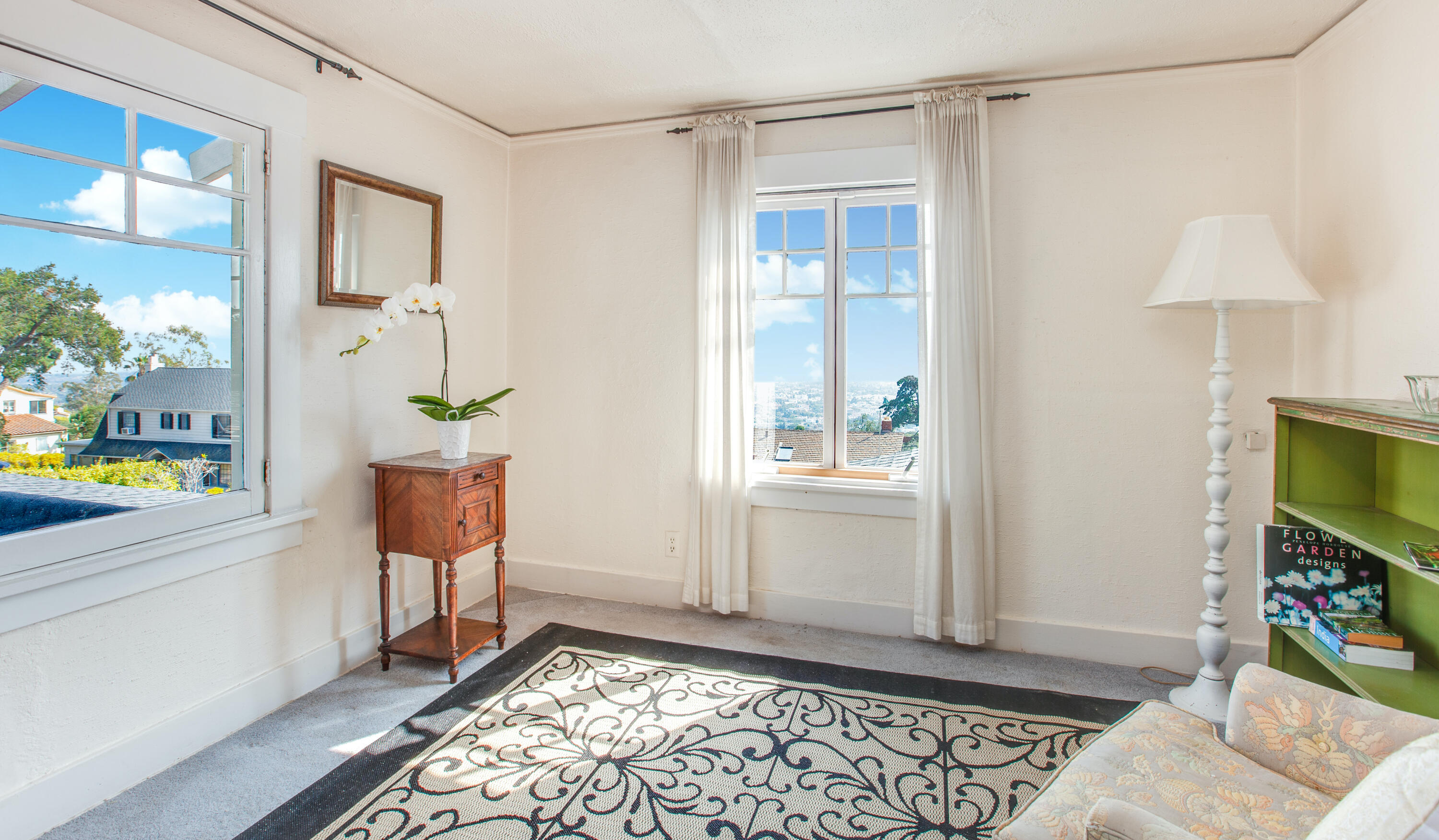 1720 Lasuen Road Santa Barbara, CA 93103 - Photo 13 of 32 a living room with furniture and a window