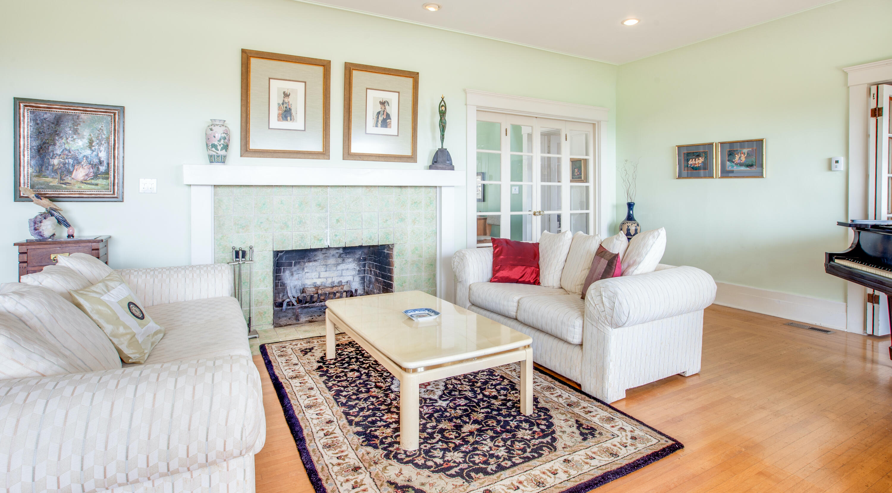 1720 Lasuen Road Santa Barbara, CA 93103 - Photo 5 of 32 a living room with furniture and a fireplace