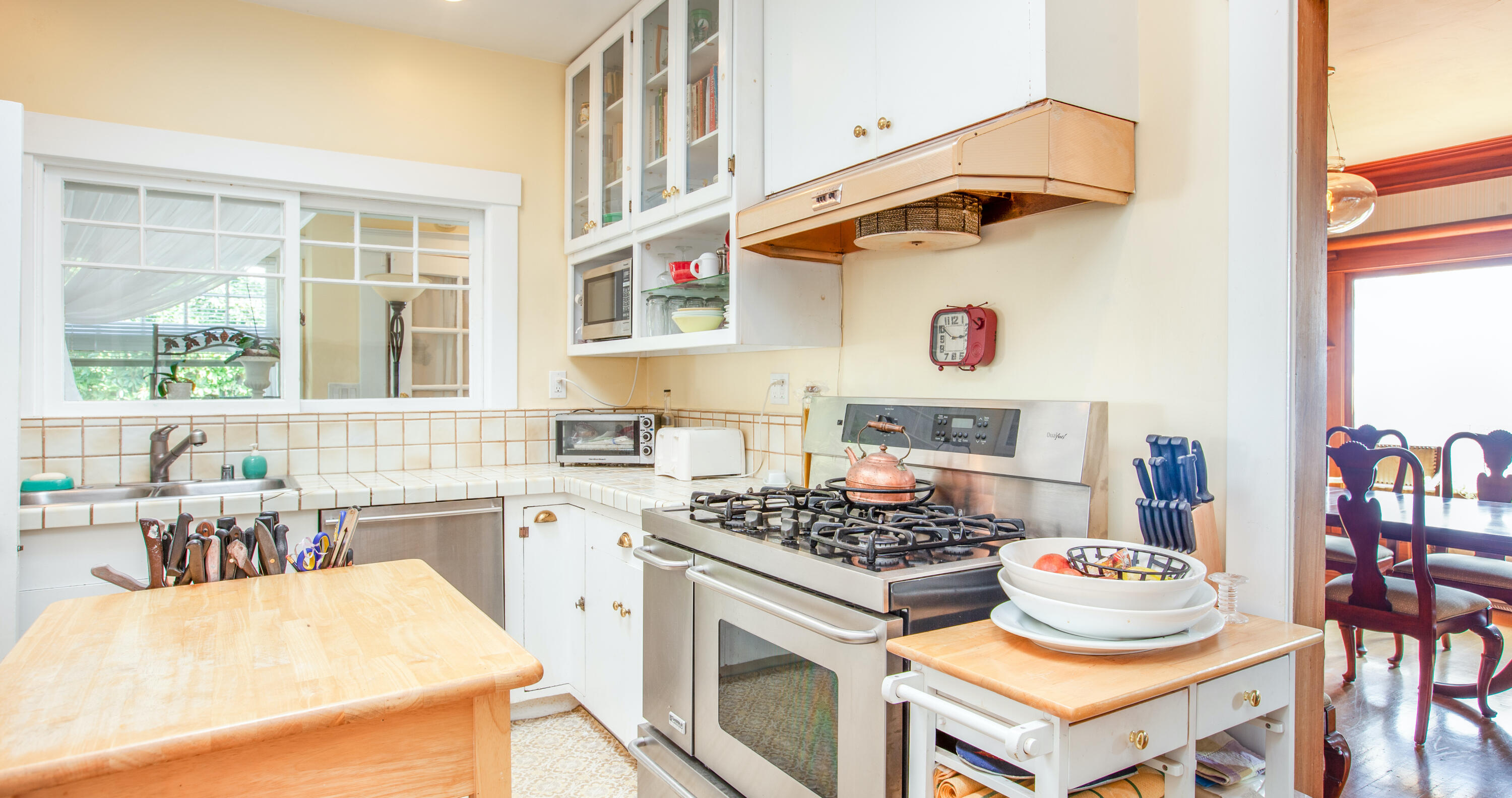 1720 Lasuen Road Santa Barbara, CA 93103 - Photo 10 of 32 a kitchen with a stove and a refrigerator