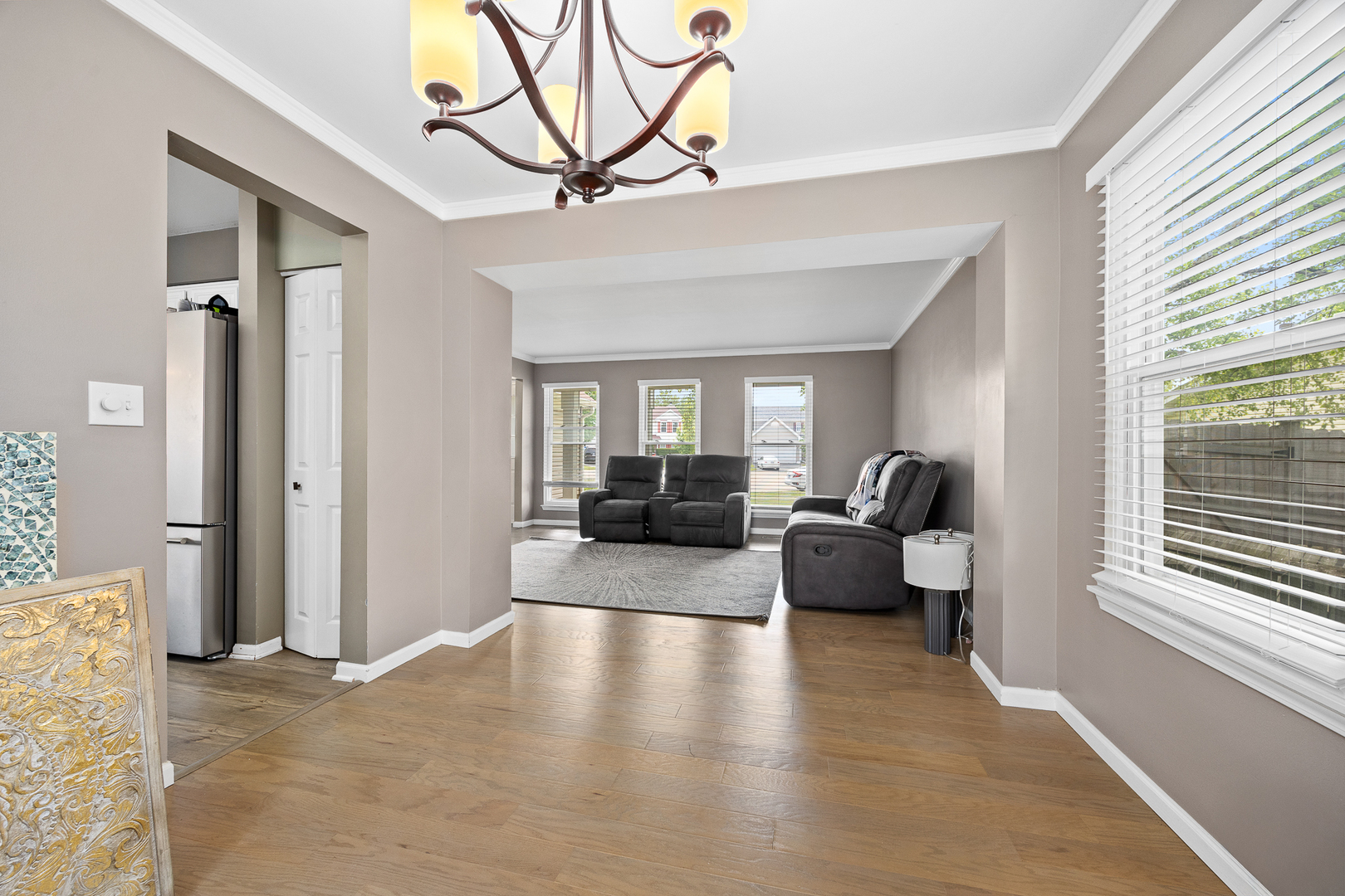 2 Buckboard Court Bolingbrook, IL 60490 - Photo 13 of 33 a living room with furniture and a large window
