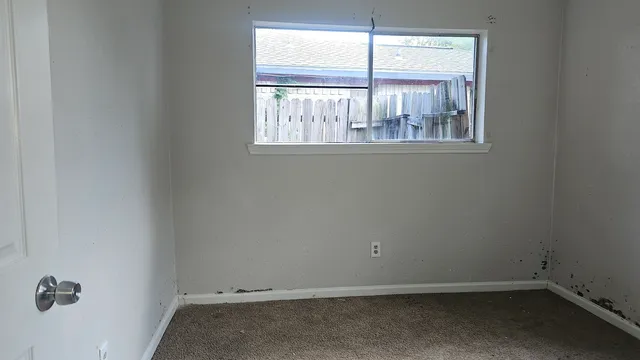 an empty room with a window
