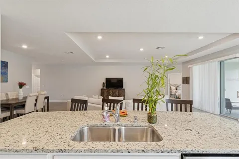 a view of a living room and dining room