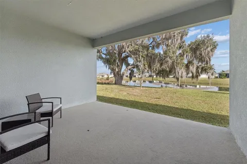 a view of room with yard and mountain view