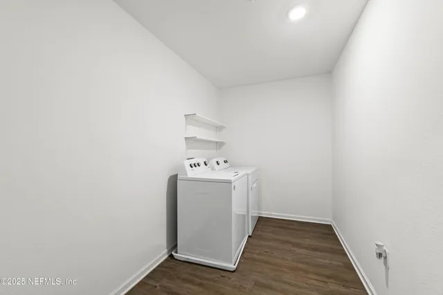 a utility room with dryer and washer