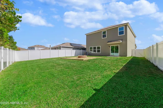 a house view with a garden space