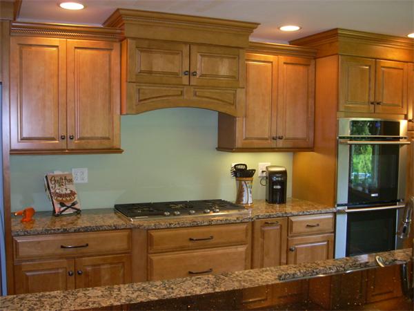 742 Amostown Road West Springfield, MA 01089 - Photo 6 of 21 a kitchen with appliances cabinets and a sink