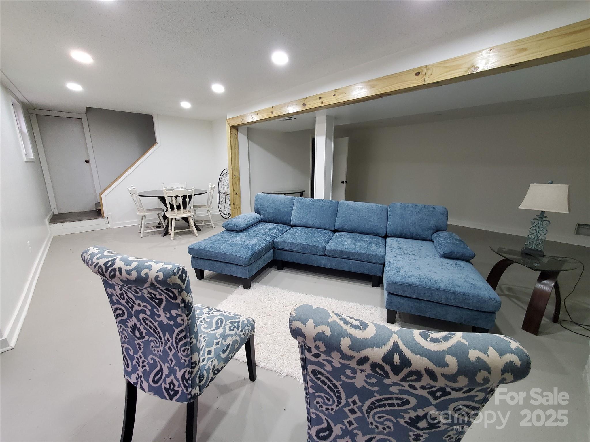2129 Rankin Road Gastonia, NC 28056 - Photo 11 of 15 a living room with furniture and wooden floor