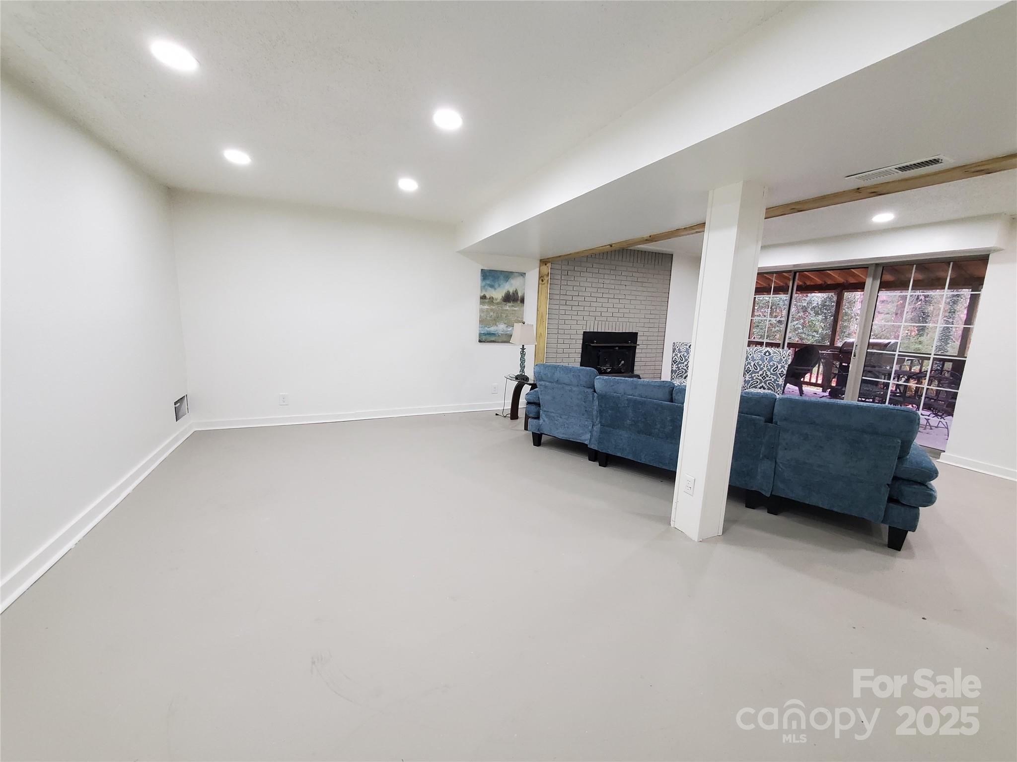 2129 Rankin Road Gastonia, NC 28056 - Photo 13 of 15 a living room with furniture and a flat screen tv