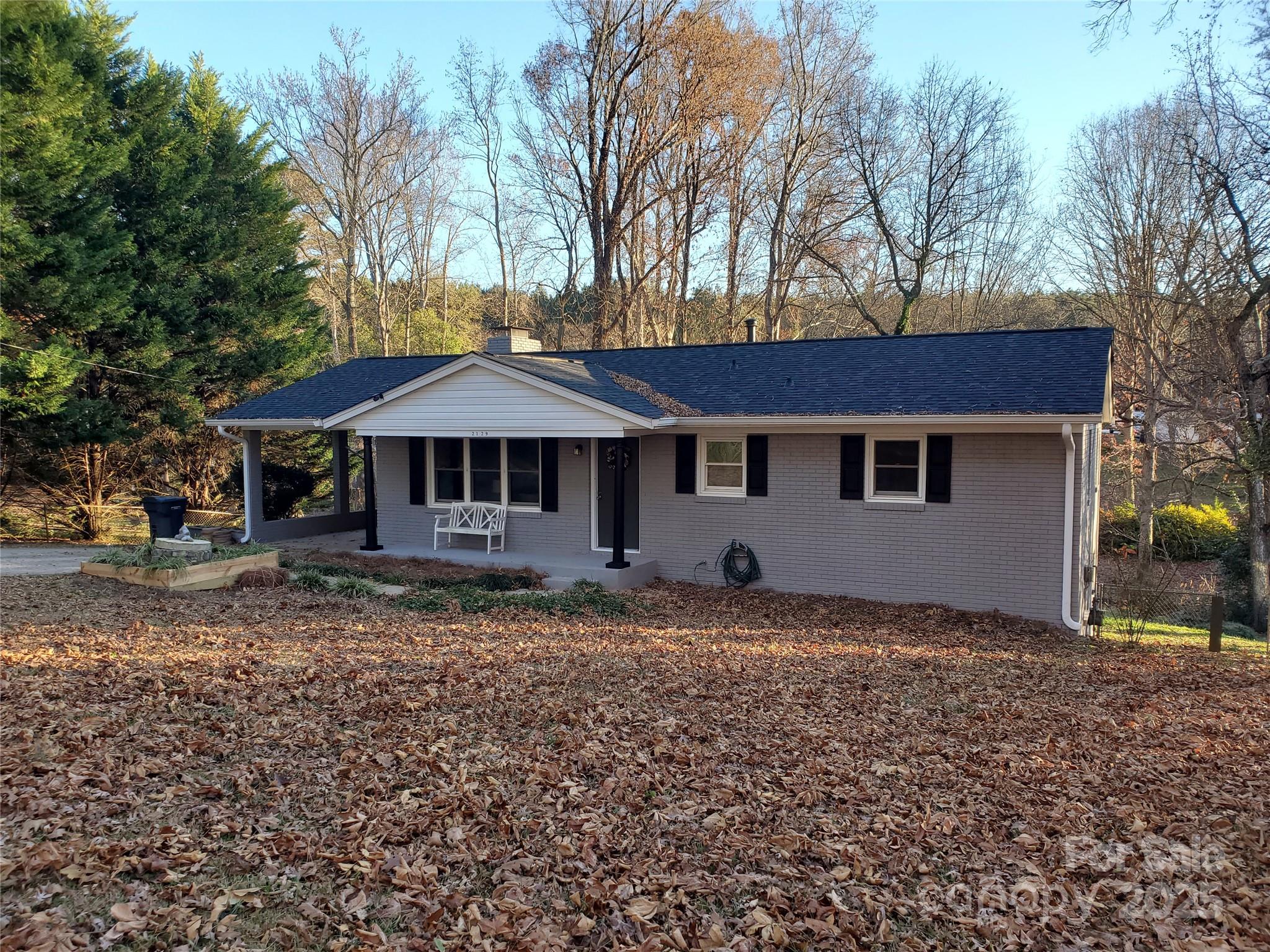 2129 Rankin Road Gastonia, NC 28056 - Photo 14 of 15 a front view of a house with a yard
