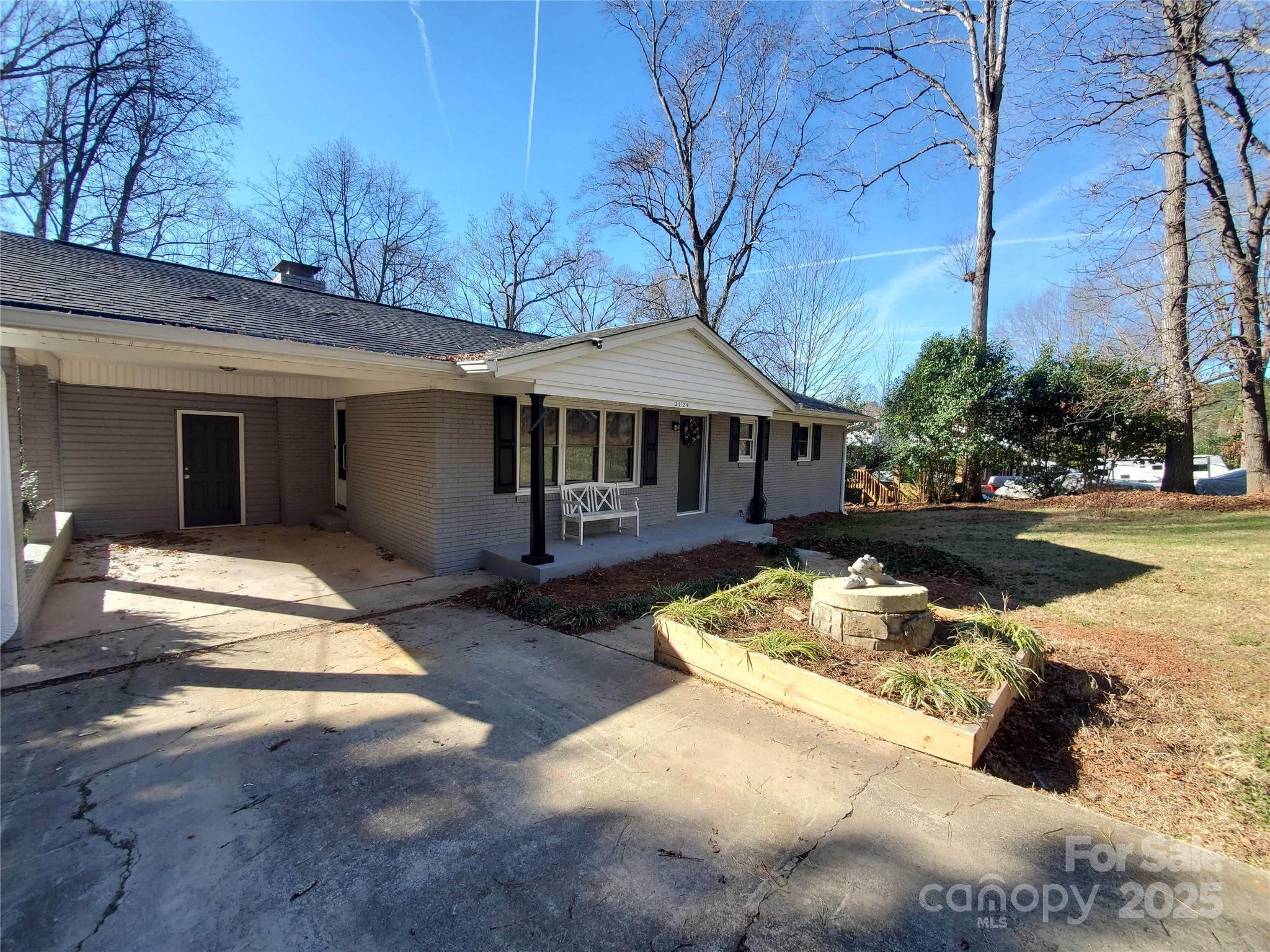 2129 Rankin Road Gastonia, NC 28056 - Photo 2 of 15 a front view of a house with a yard