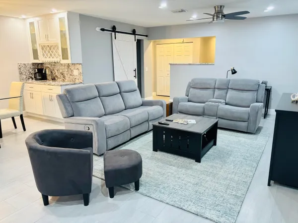 a living room with furniture and a couch