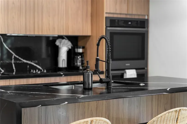 a close view of shoes and a stove