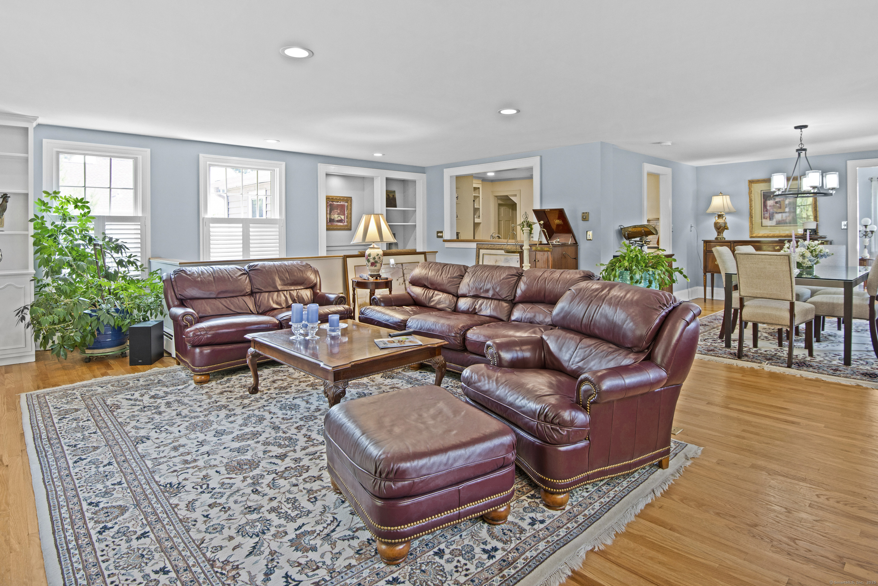 13 Maple Avenue Essex, CT 06426 - Photo 13 of 31 a living room with furniture and a potted plant