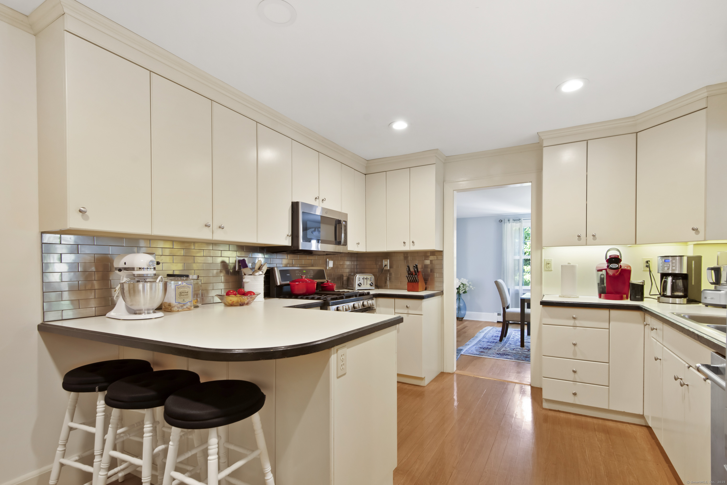 13 Maple Avenue Essex, CT 06426 - Photo 18 of 31 a kitchen with a sink cabinets and wooden floor