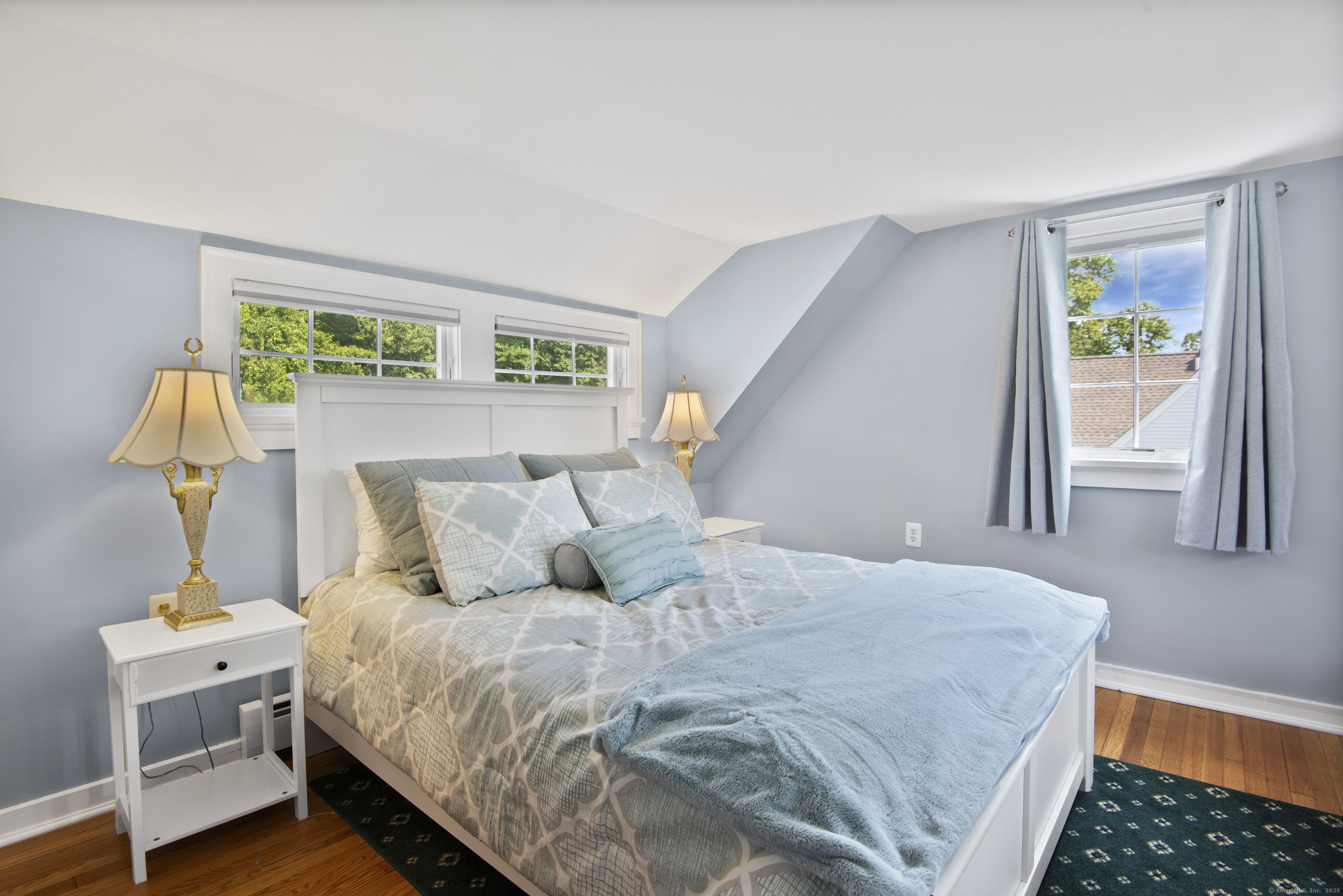 13 Maple Avenue Essex, CT 06426 - Photo 25 of 31 a bedroom with a bed and a window