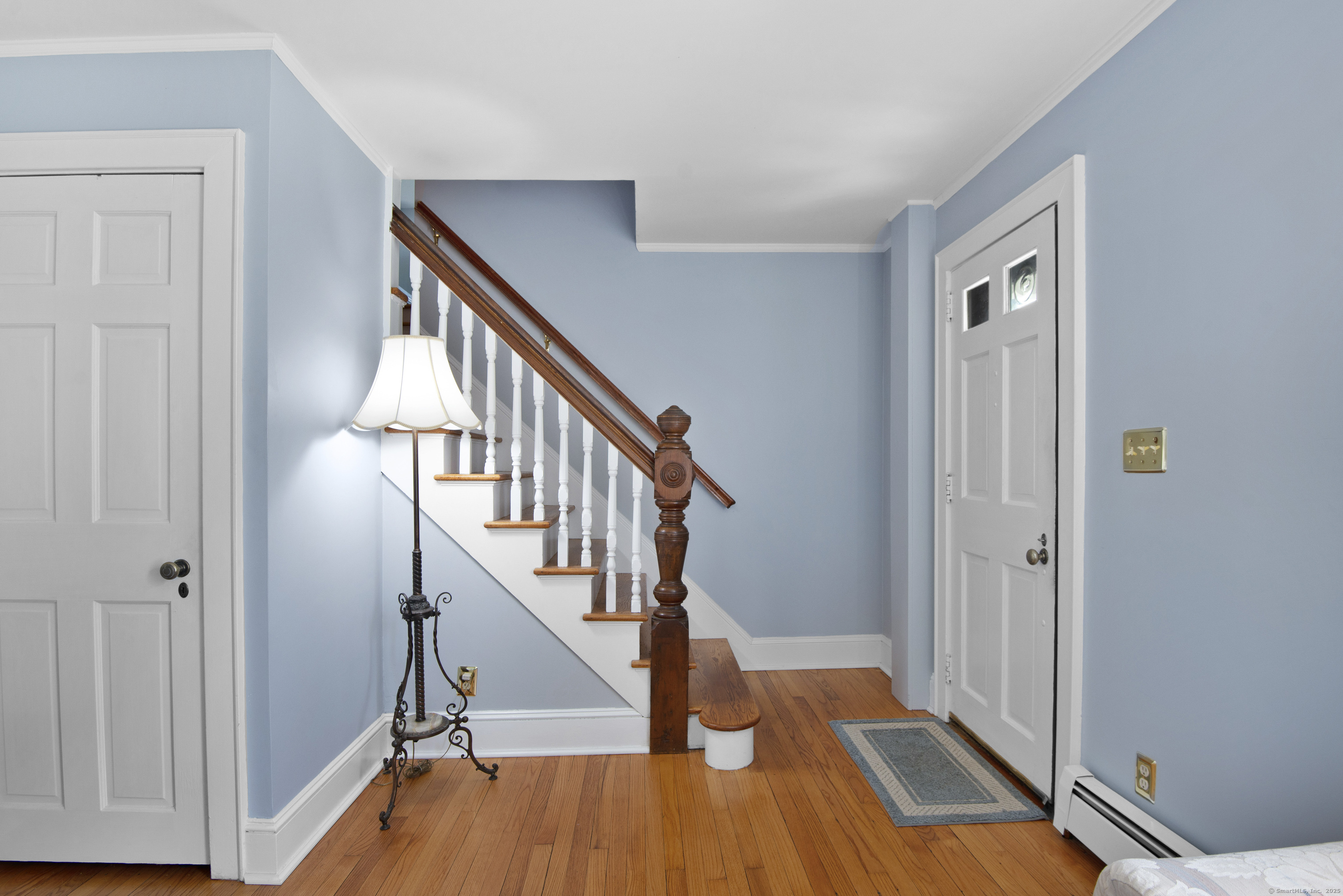 13 Maple Avenue Essex, CT 06426 - Photo 4 of 31 a view of a hallway with wooden floor and staircase