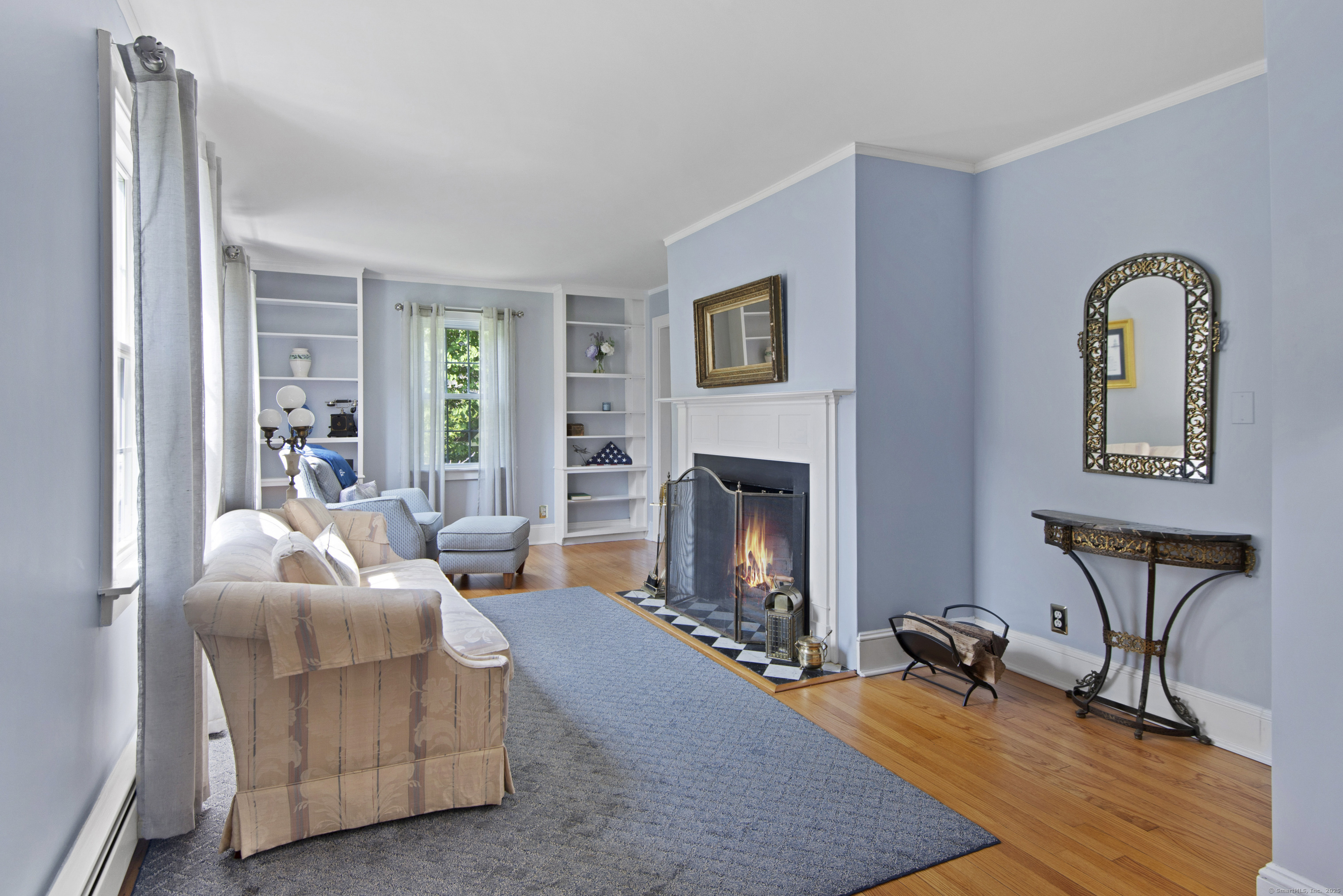13 Maple Avenue Essex, CT 06426 - Photo 5 of 31 a living room with furniture and a fireplace