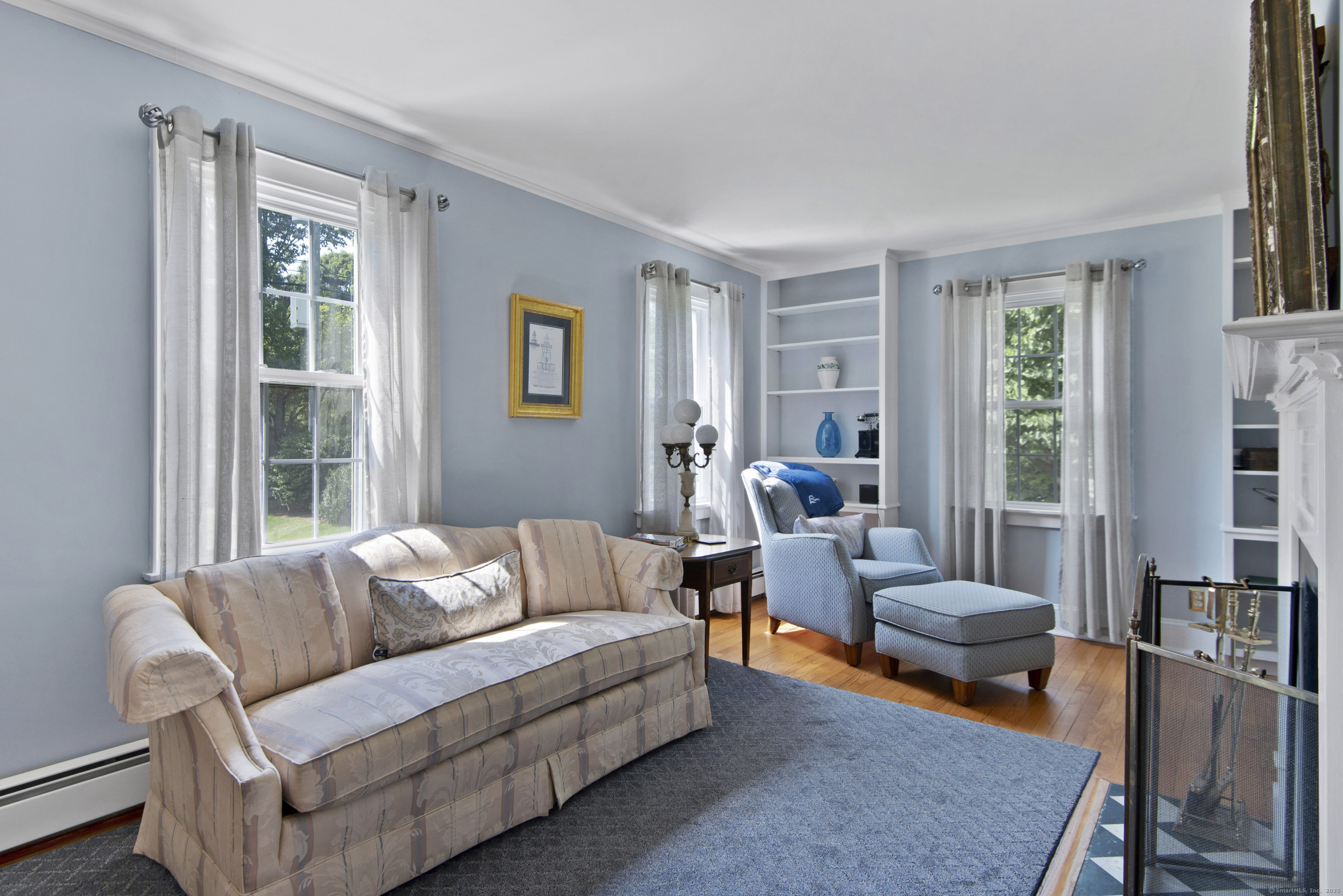 13 Maple Avenue Essex, CT 06426 - Photo 6 of 31 a living room with furniture and a large window