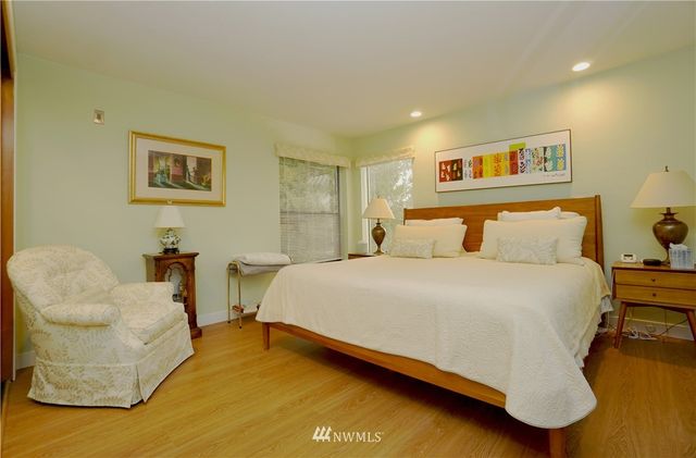 a bedroom with a bed and furniture