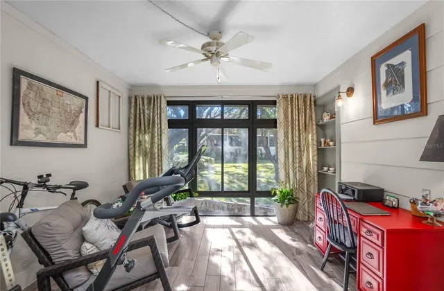a very nice looking living room with a large window