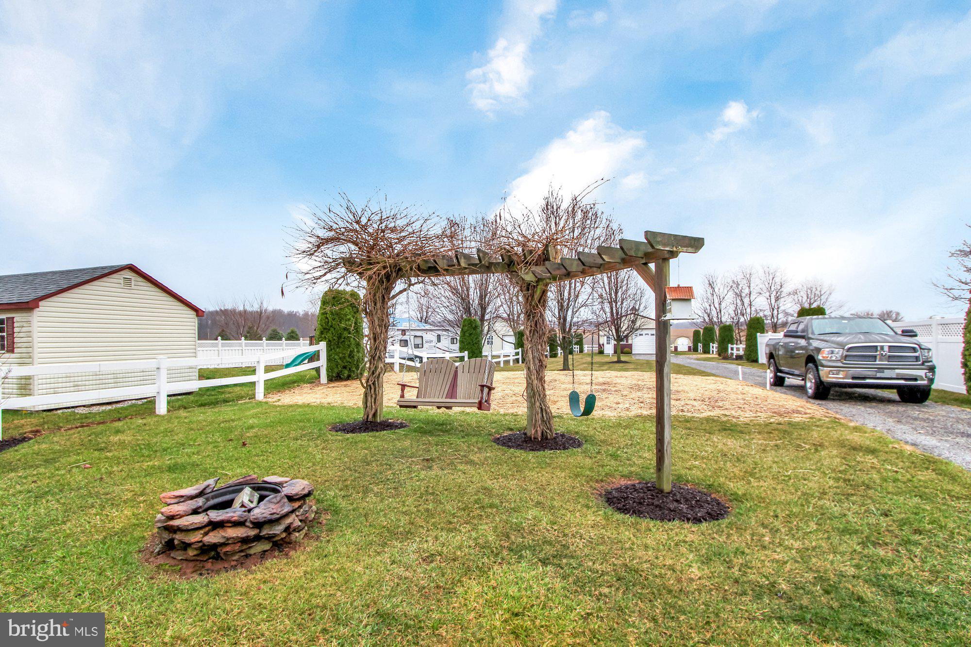 6792 Church Road, Unit 1 Felton, PA 17322 - Photo 26 of 28 Firepit and Swing Area