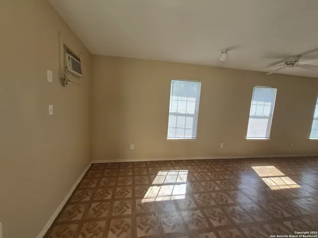 an empty room with windows