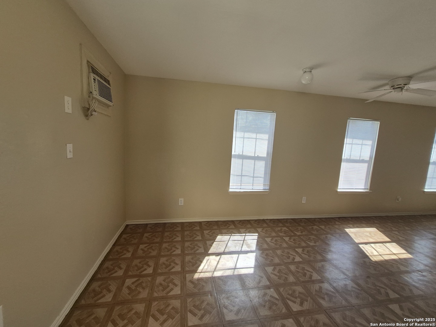 1016 Blanco Road, Unit 203 San Antonio, TX 78212 - Photo 3 of 12 an empty room with windows