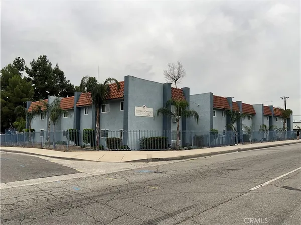 a view of a building with a street