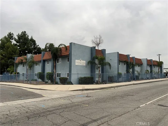 a view of a building with a street