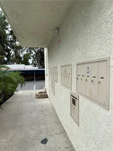 a view of a street with cars on the road