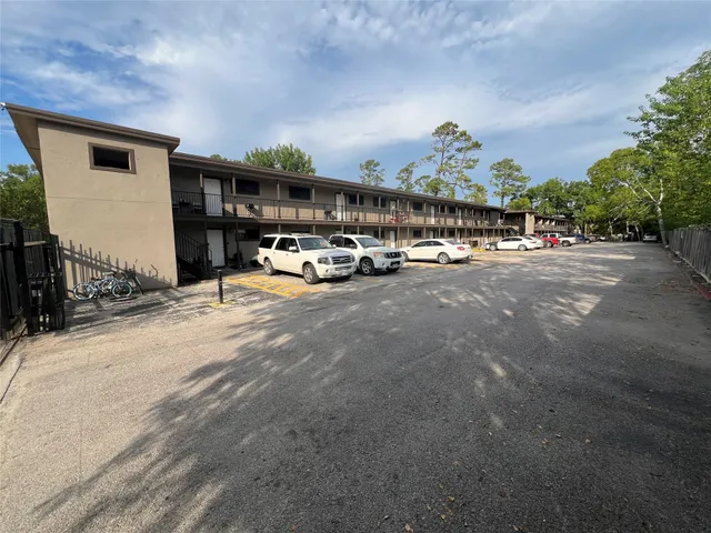 a view of a street with cars