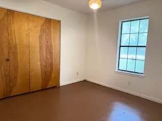 an empty room with windows