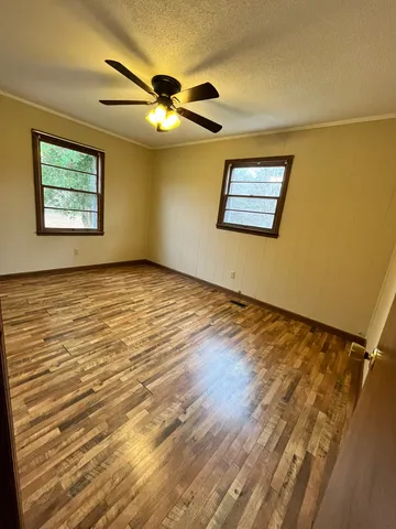 an empty room with windows