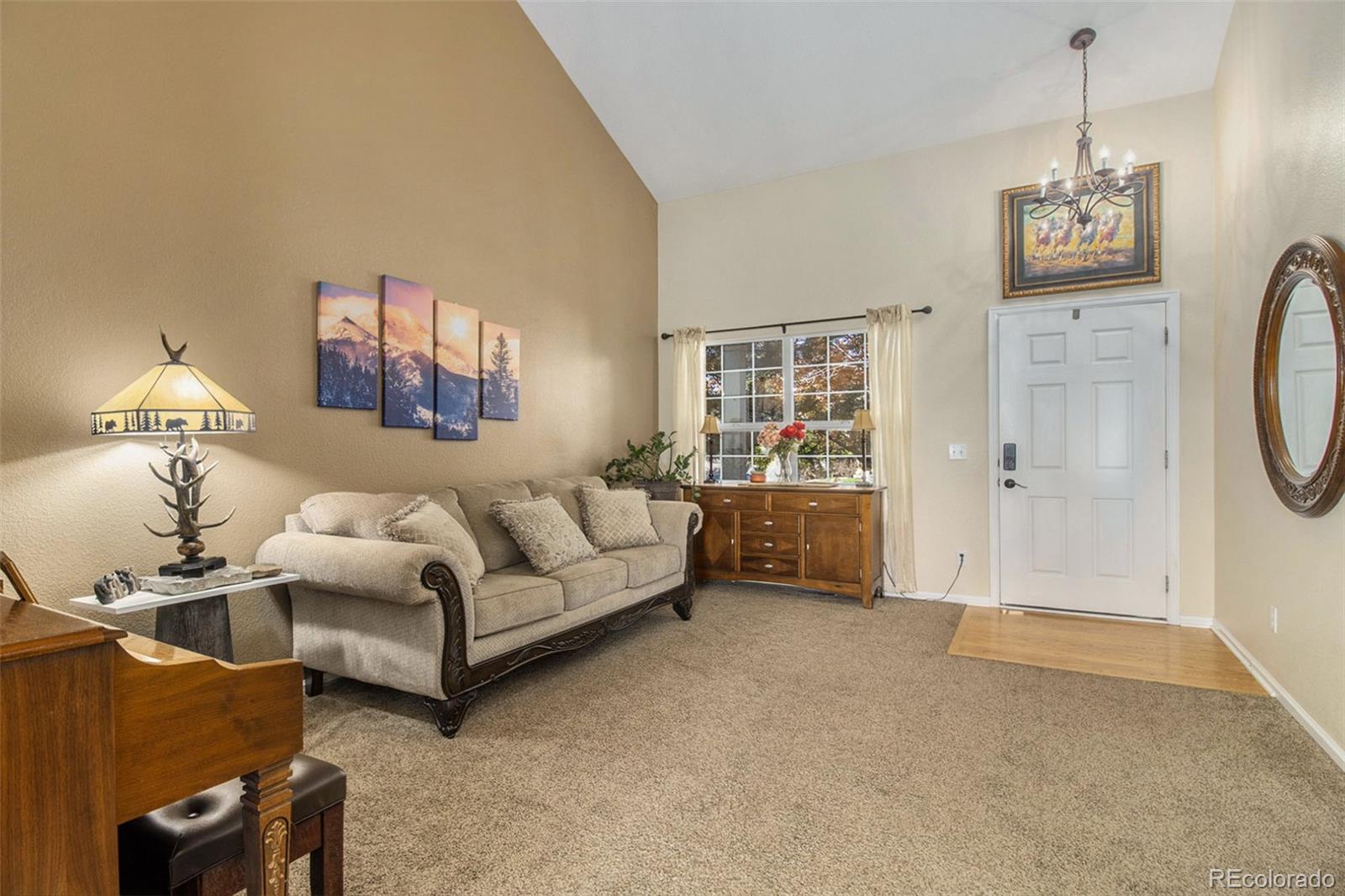 1082 Riddlewood Road Highlands Ranch, CO 80129 - Photo 5 of 28 a living room with furniture