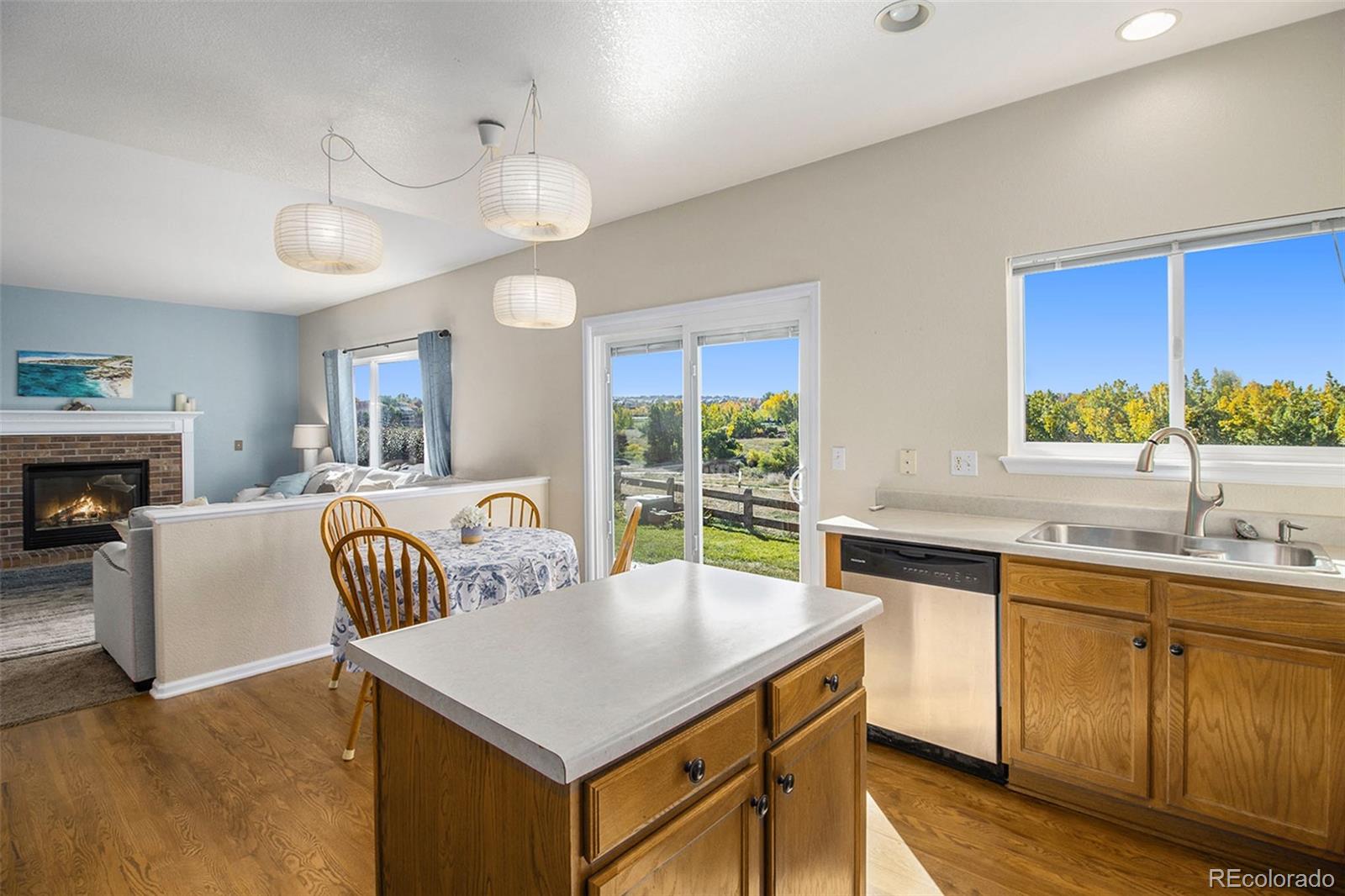 1082 Riddlewood Road Highlands Ranch, CO 80129 - Photo 6 of 28 a view of kitchen with breakfast area