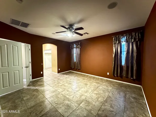 a bathroom with a double vanity sink mirror and shower