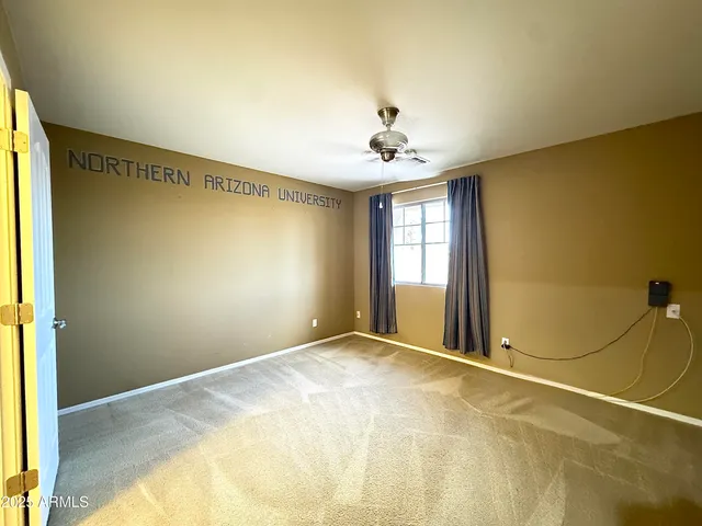 a view of a patio with couches and potted plants