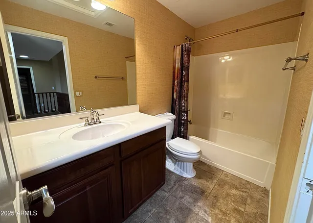 a view of swimming pool with outdoor seating and plants
