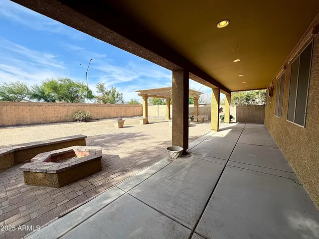 a view of a garden with palm trees