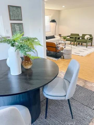 a view of a dining room with furniture