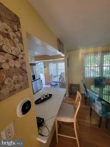 a room with furniture and wooden floor