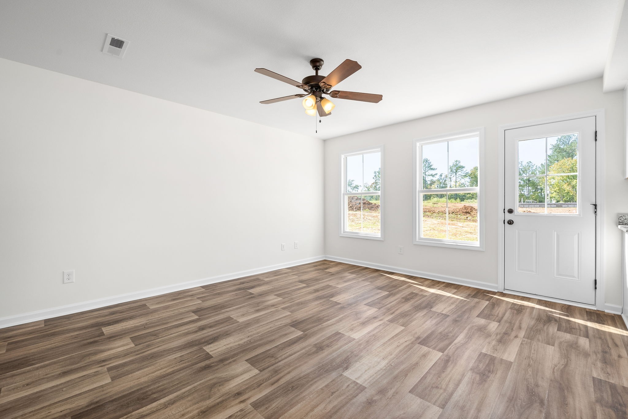 148 Quarry Rdg Road Clarksville, TN 37043 - Photo 8 of 37 a view of a livingroom with a window and wooden floor