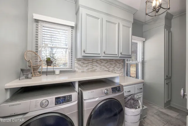 a bathroom with a sink mirror and toilet