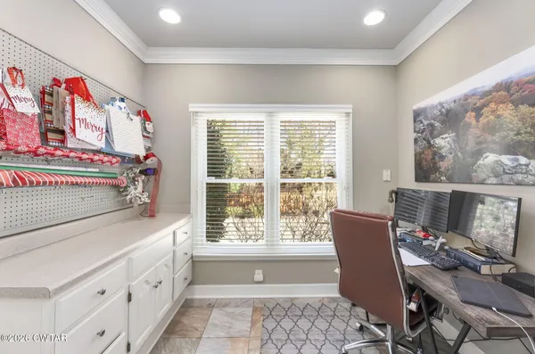 a bathroom with a granite countertop sink toilet a mirror and shower