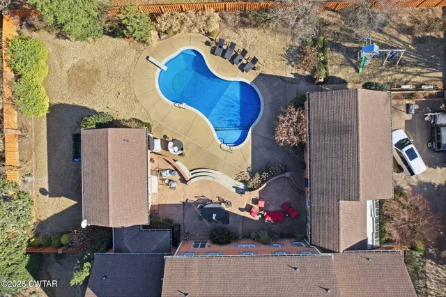 an aerial view of residential house with outdoor space
