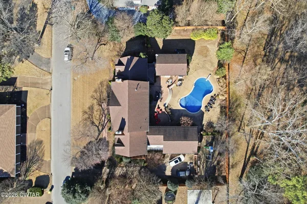 an aerial view of residential house with outdoor space